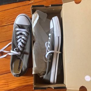 New converse low tops, never worn, still in box. Unisex mens 9/womens 11.
